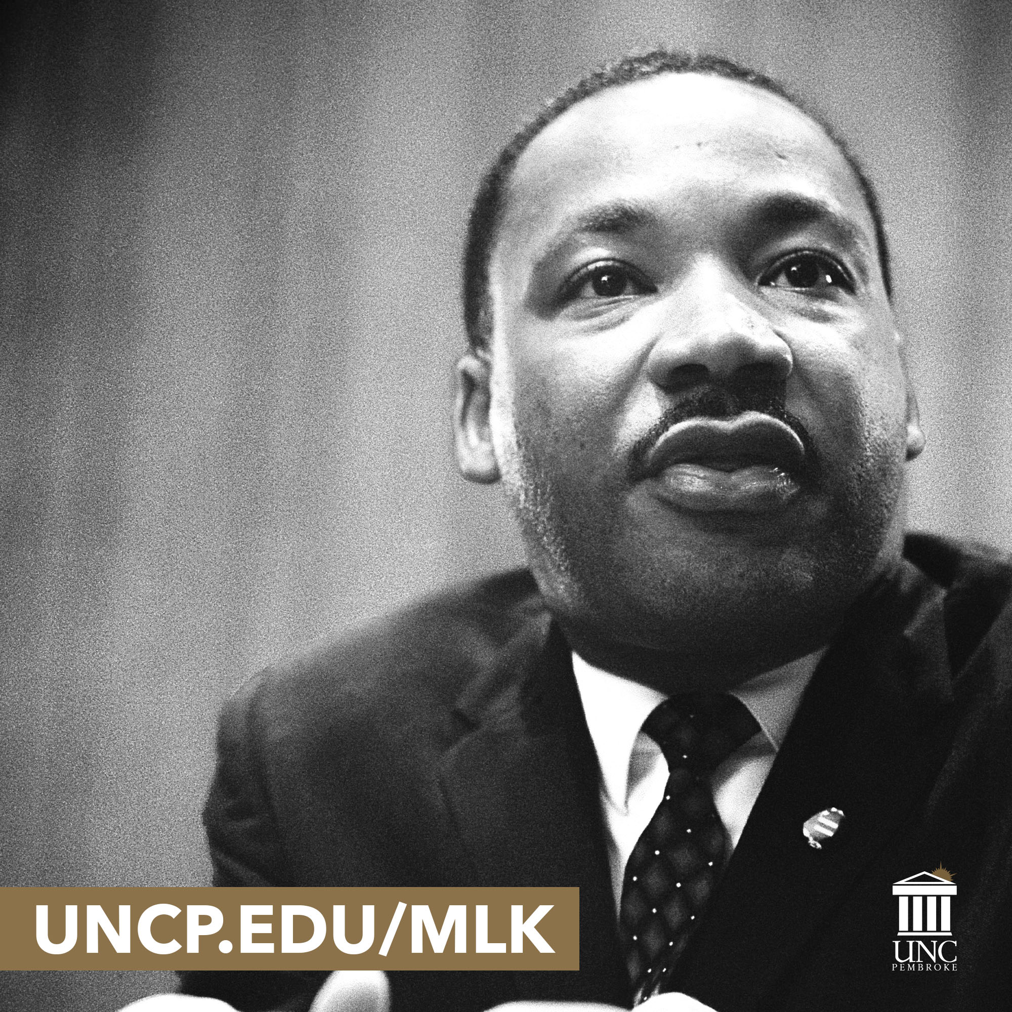 A black and white image of Martin Luther King Jr.