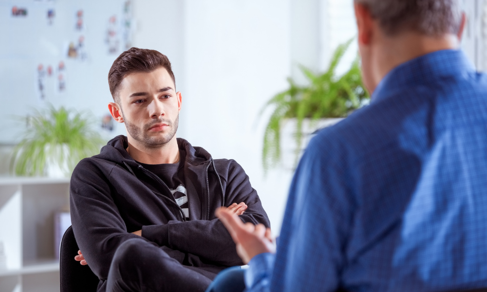 male being counseled and getting support