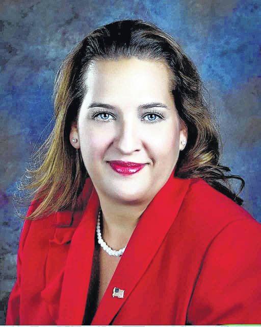 A portrait headshot of Faline Locklear Dial