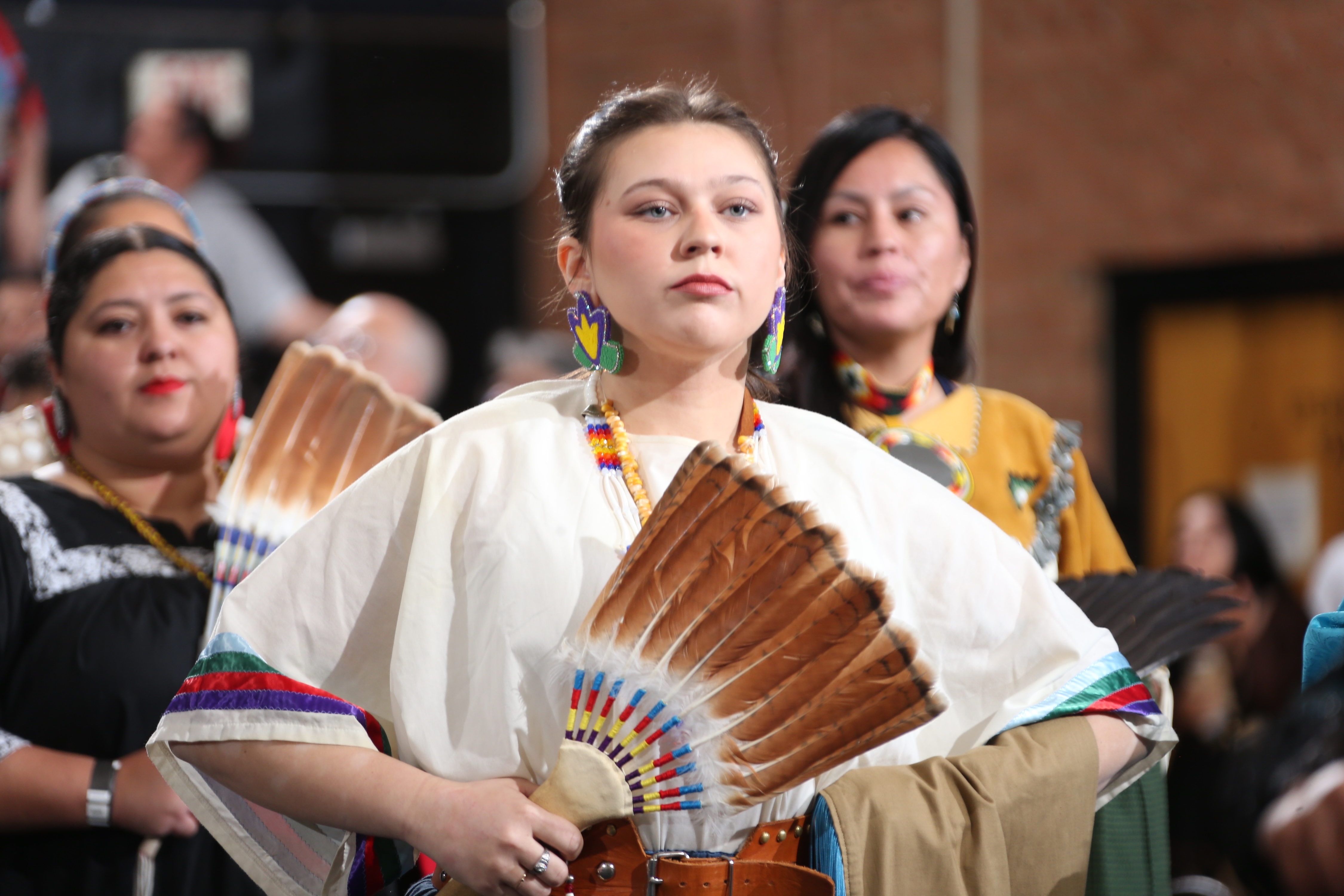 Lydia Mansfield dances holding traditional fan