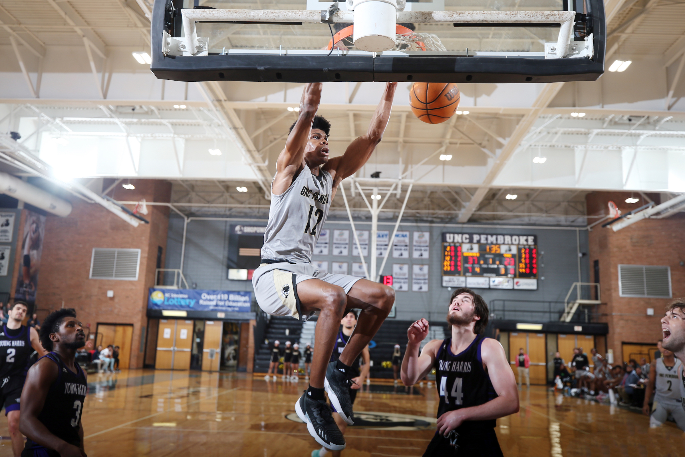 Elijah Cobb brings the crowd to their feet with a dunk against Young Harris