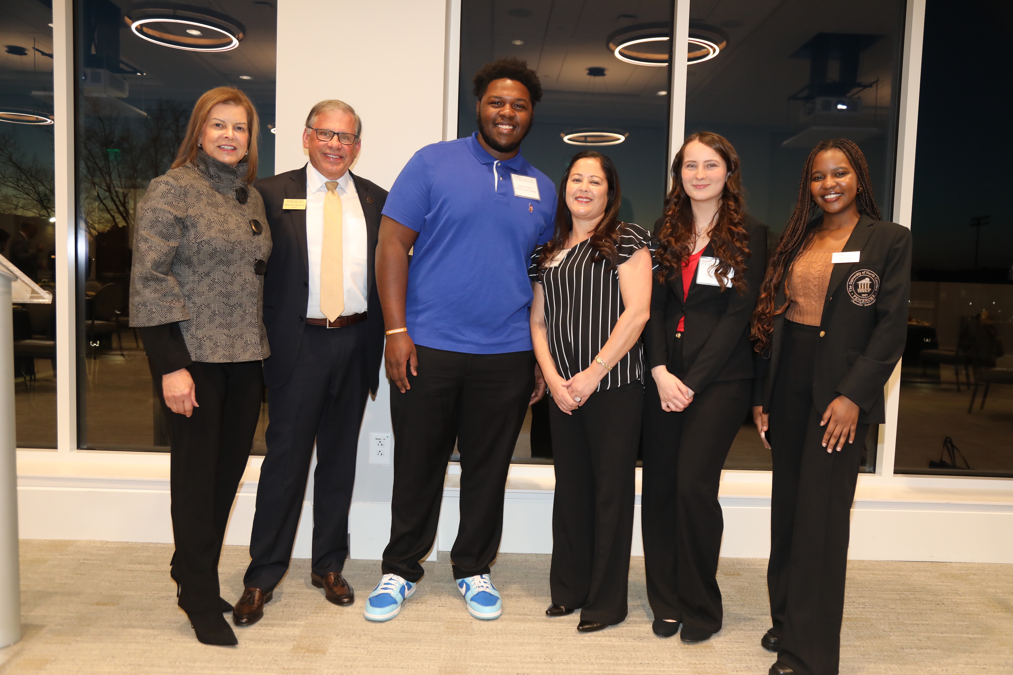 UNCP First Lady Rebecca Cummings, far left, and Chancellor Robin Gary Cummings are pictured with UNCP students Amari Chance, Tasha Locklear, Olivia Peal and Anesu Mavihya