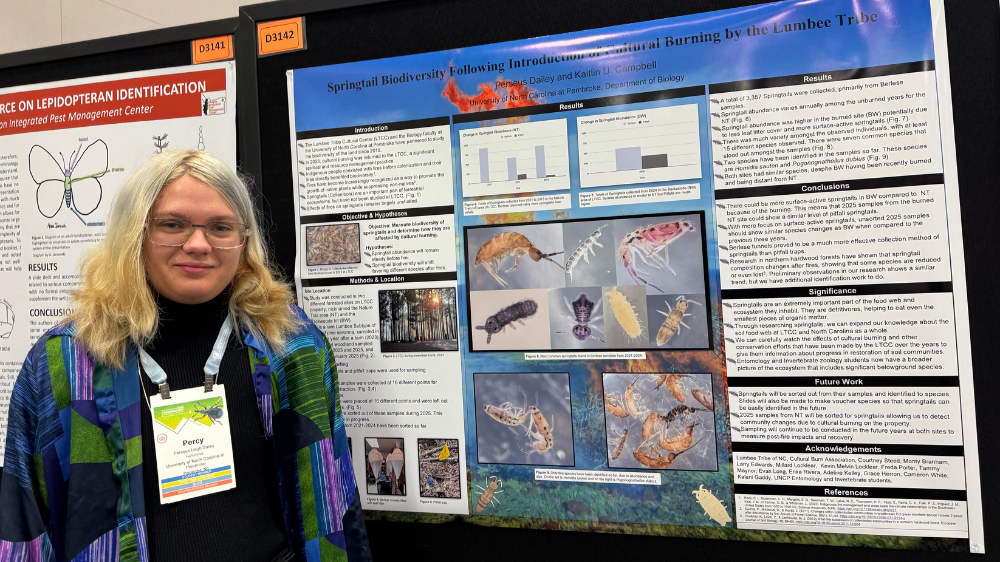 UNCP Biology student Perseus Daily stands beside his first-place research poster on springtail biodiversity at the 2025 Entomological Society of America national conference.