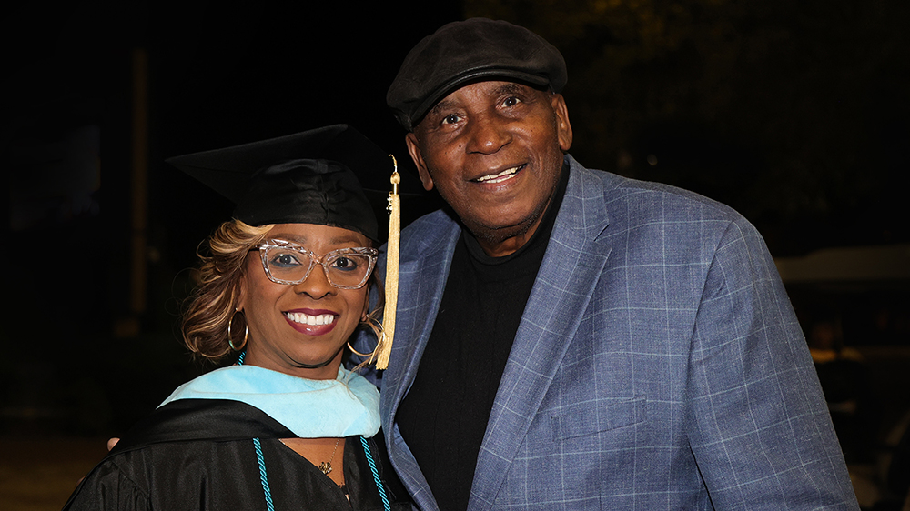 Howard McCleod ’75 and his daughter, Beverly Williams Dockery, celebrate her graduation at UNC Pembroke.