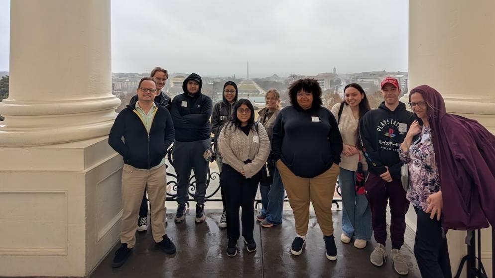 UNCP students and faculty pose on the steps of the U.S. Capitol overlooking the Washington Monument during the Spring Break Study Away trip to Washington, D.C.