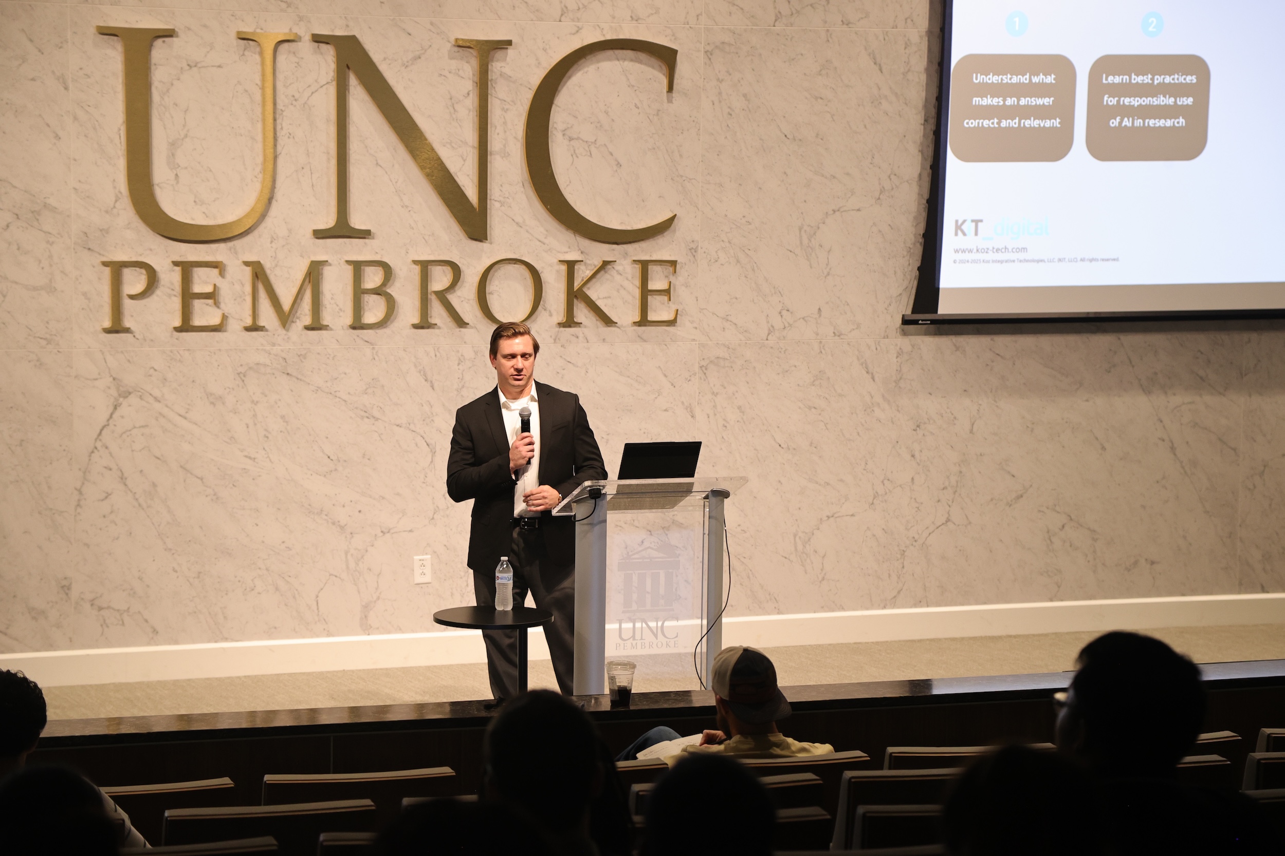 John Kozlowski serves as a guest lecture at UNCP