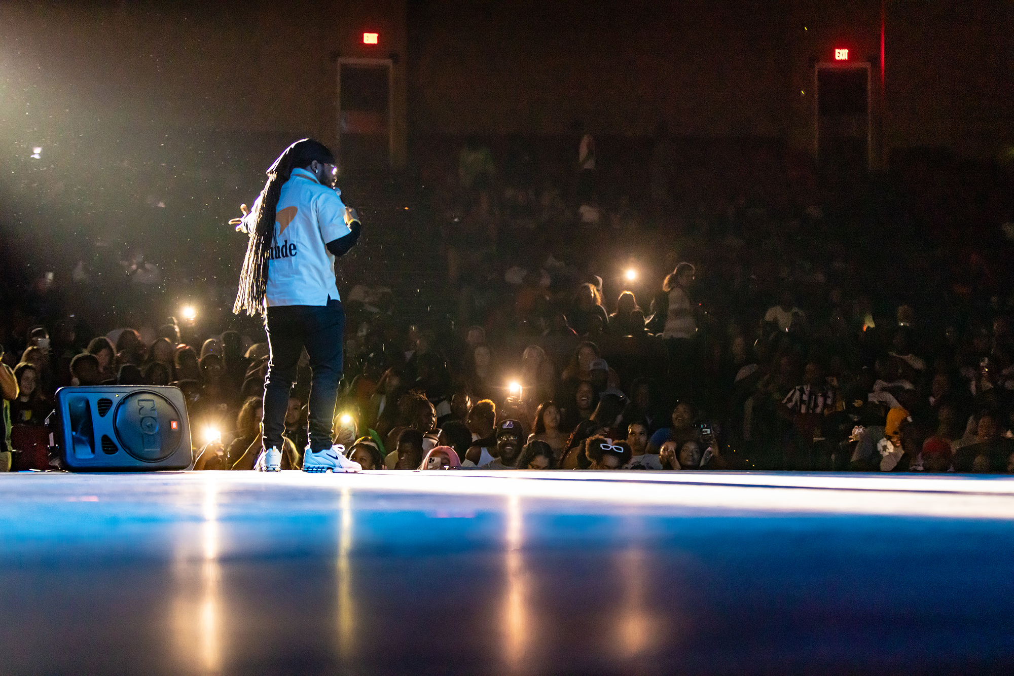 performer on the stage of the Givens Performing Arts Center