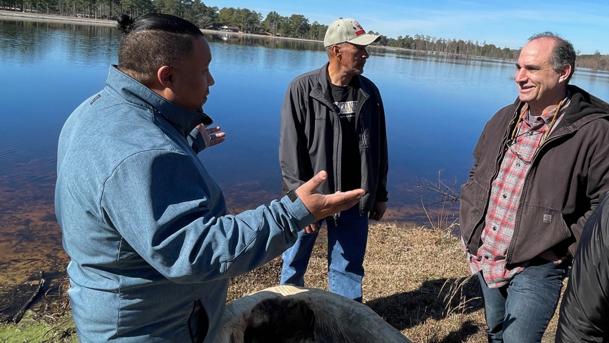 Harlan Chavis explains the process to the Nature Conservancy representatives.