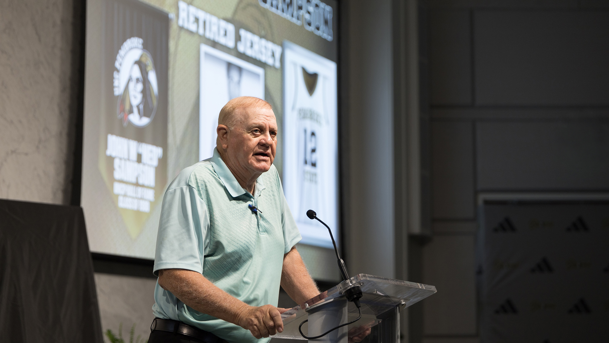 Joe Locklear speaks at Ned Sampson's jersey retirement ceremony.