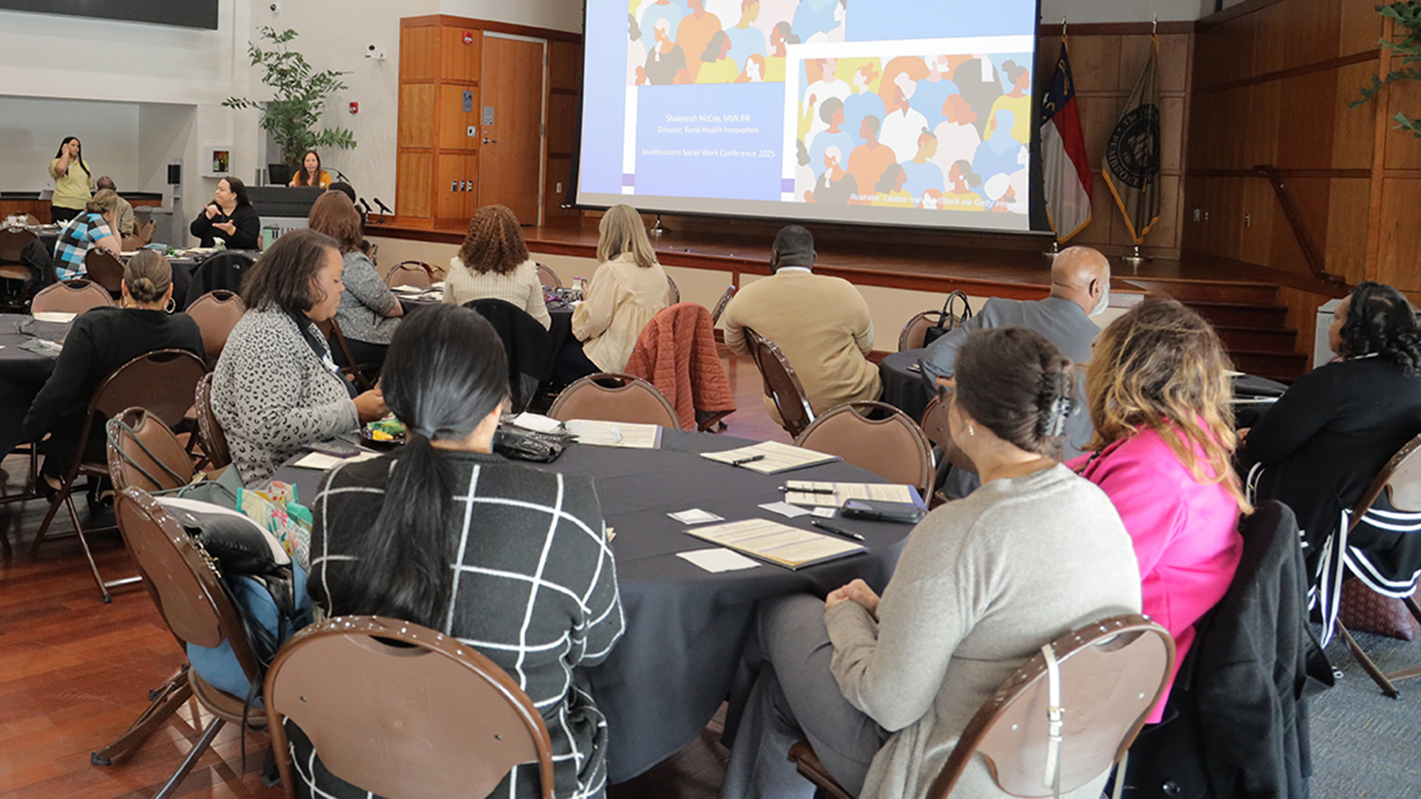 Session in a banquet hall during a UNCP Conference