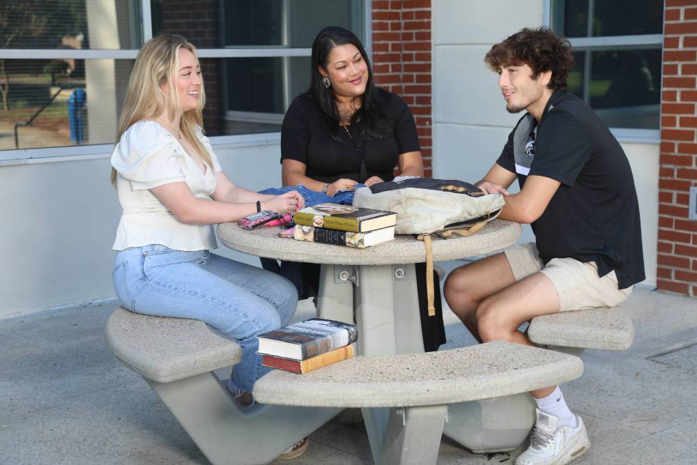 students at table studying