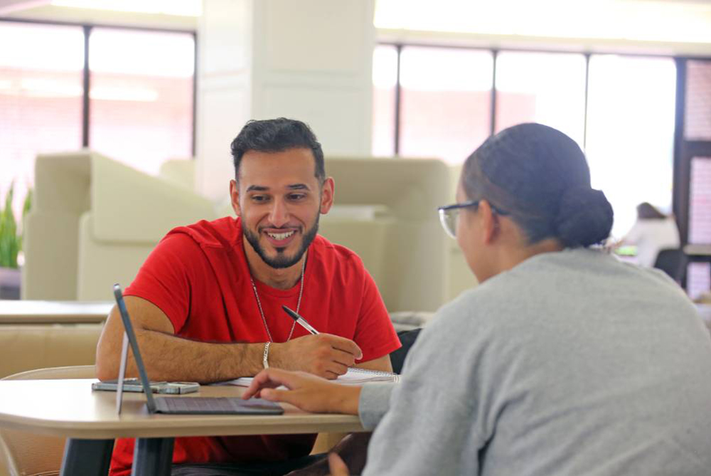 Two students on computer