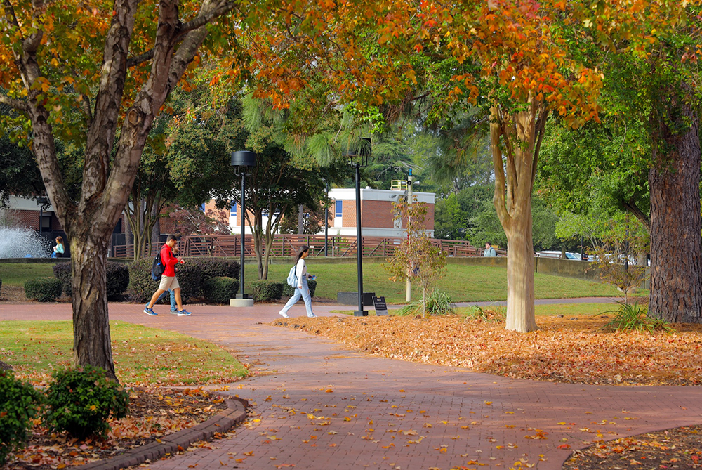 students walking on campus UNCP