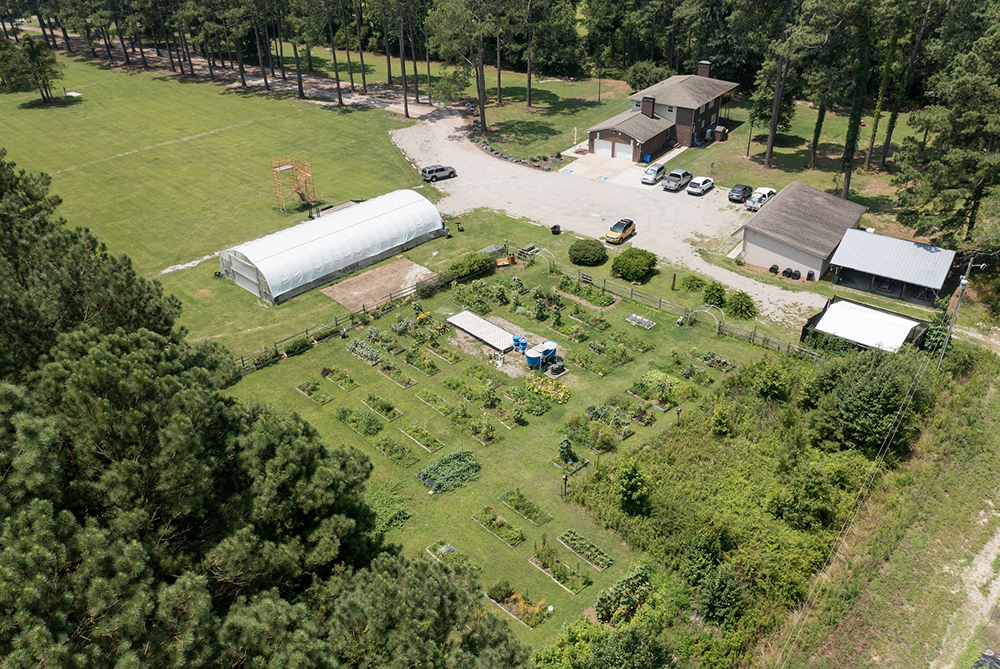 An aerial view of the UNCP campus garden, representing the Garden and Apiary program available to agriculture students.