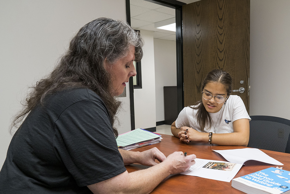 UNCP english teacher with student advising