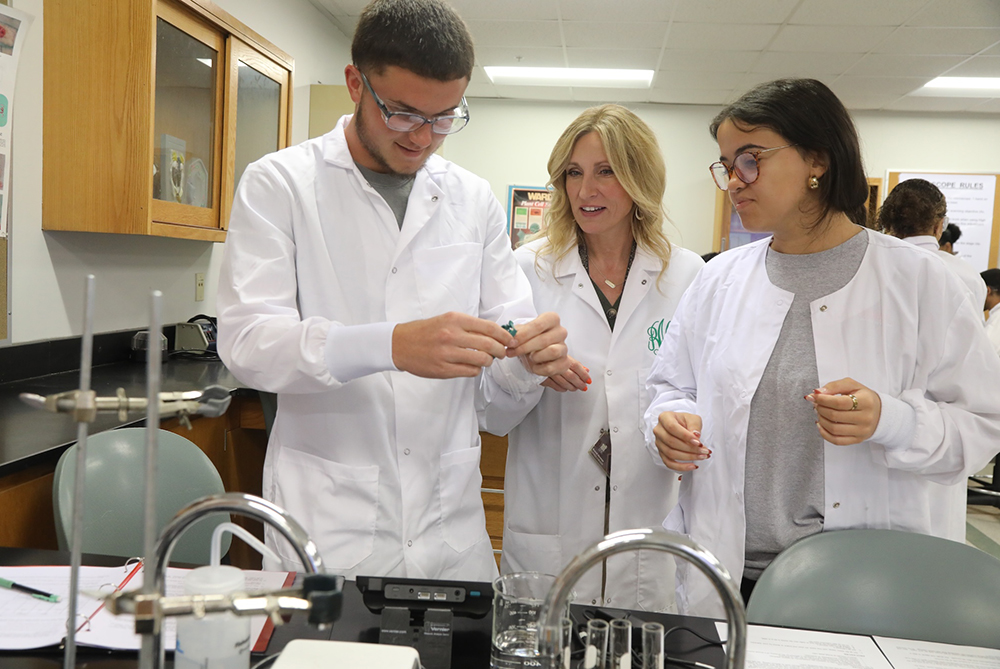 students in lab with teacher at UNCP