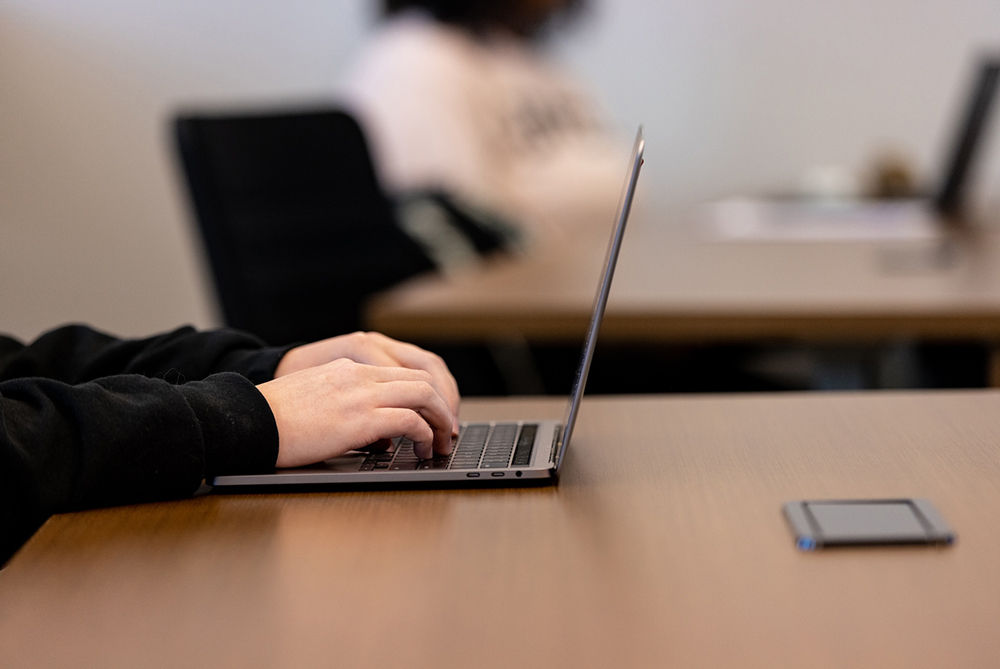 Hands on laptop UNCP student