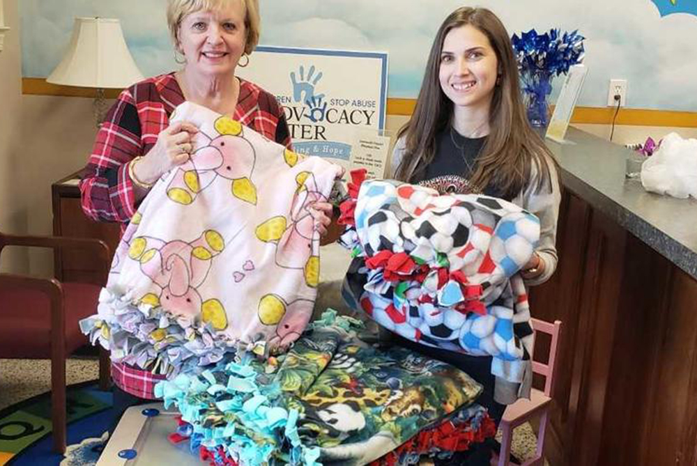 student with a blanket