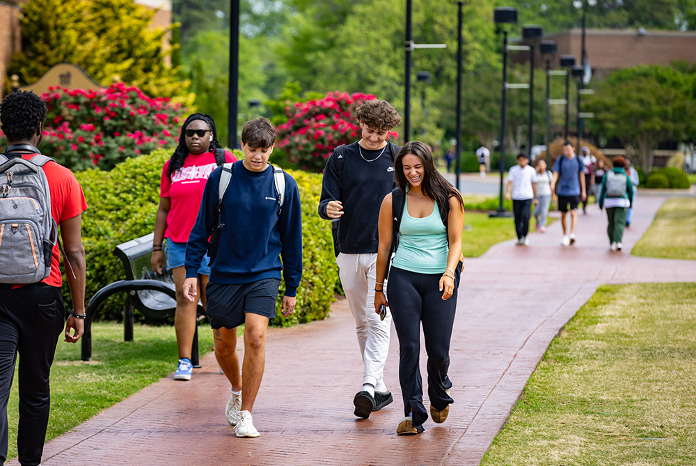 student walking on campus