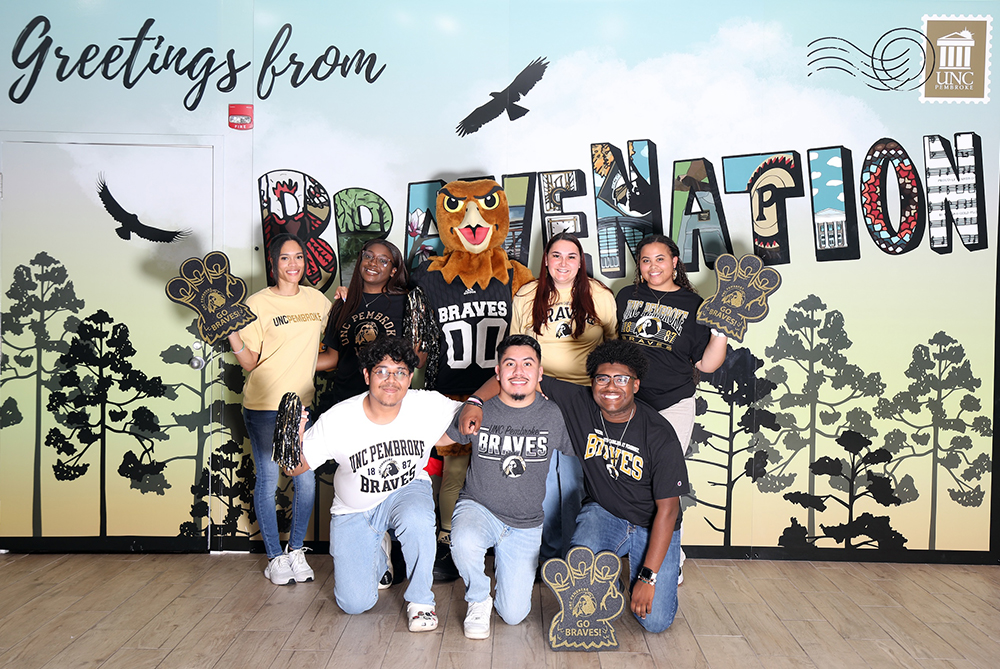 Students with BraveHawk UNCP