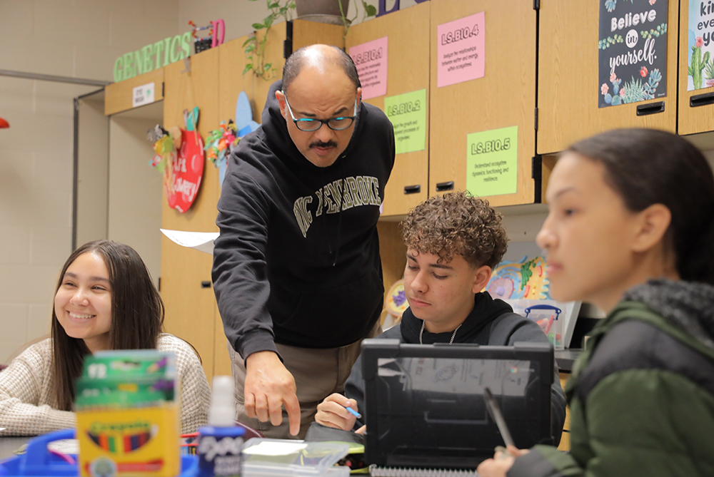 UNCP teacher in a middle school classroom