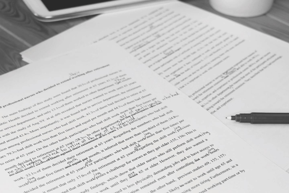 An essay with markups on it