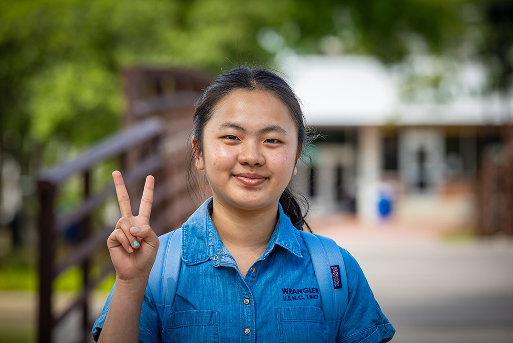 Asian student on UNCP campus