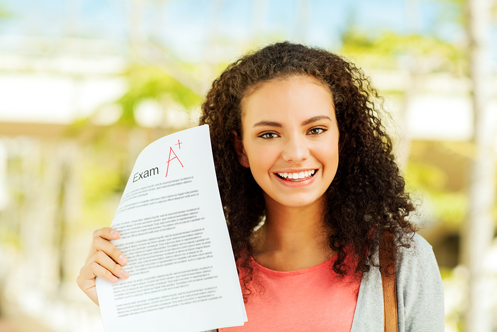 high school girl with transcript graded paper