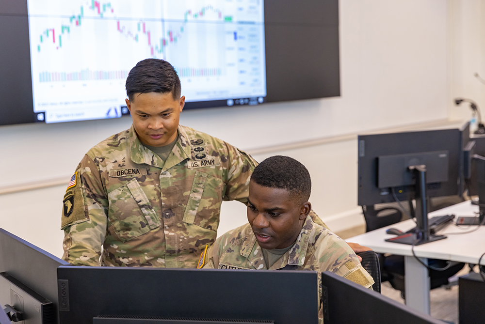 Students at UNCP business trade room