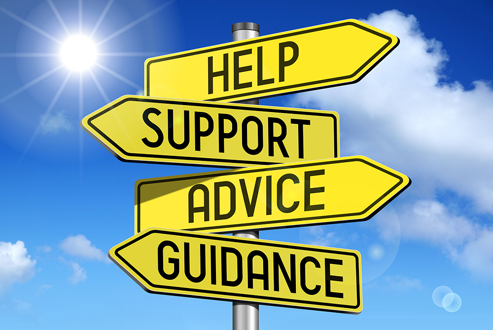 road sign that says assistance, guidance, help