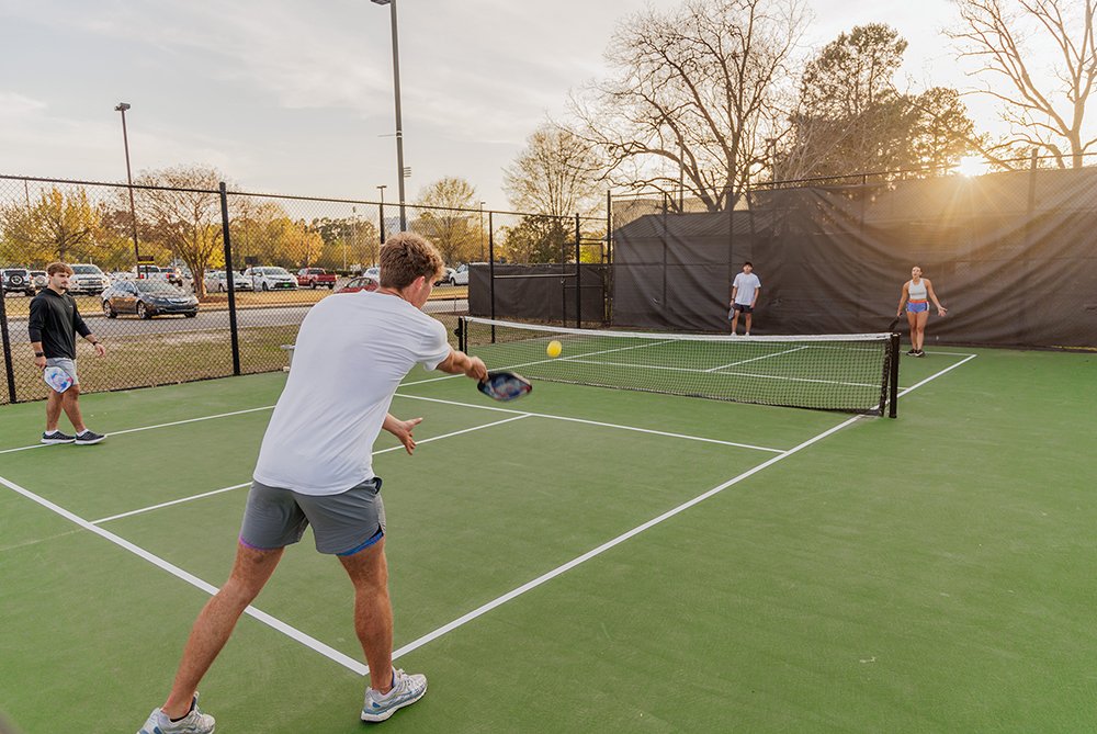 Students playing in a Pickleball tournament