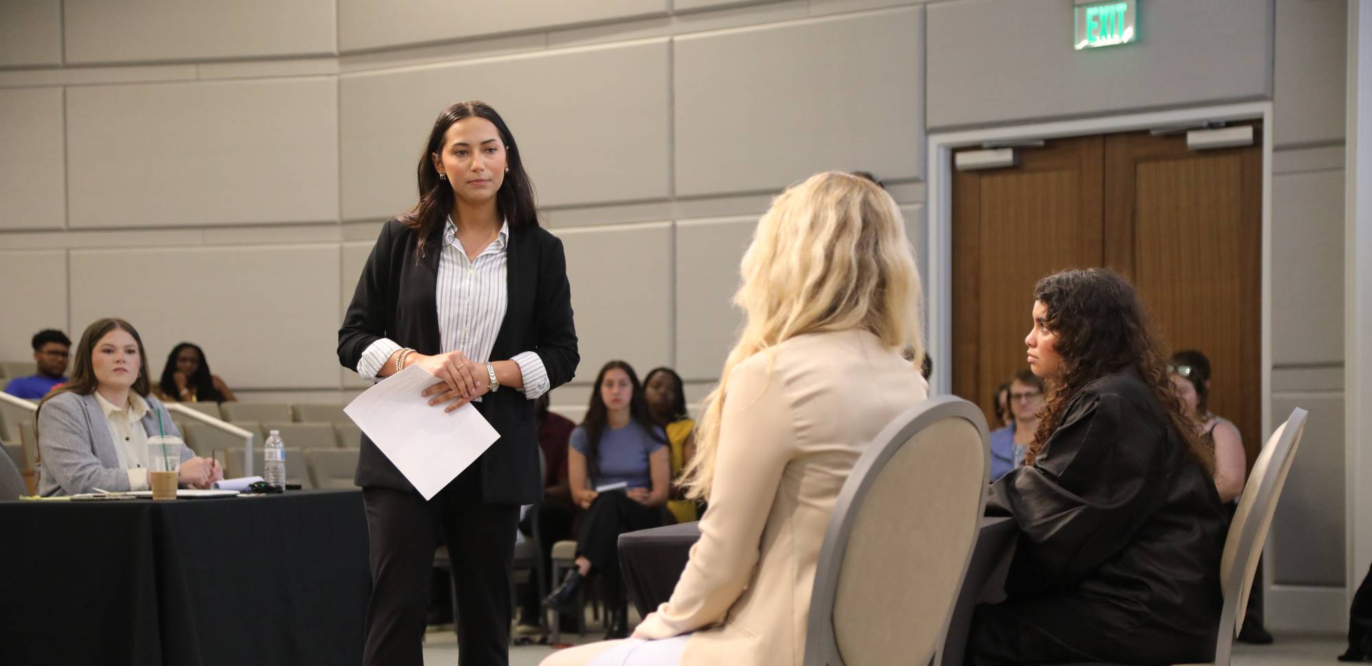 Business woman standing and smiling