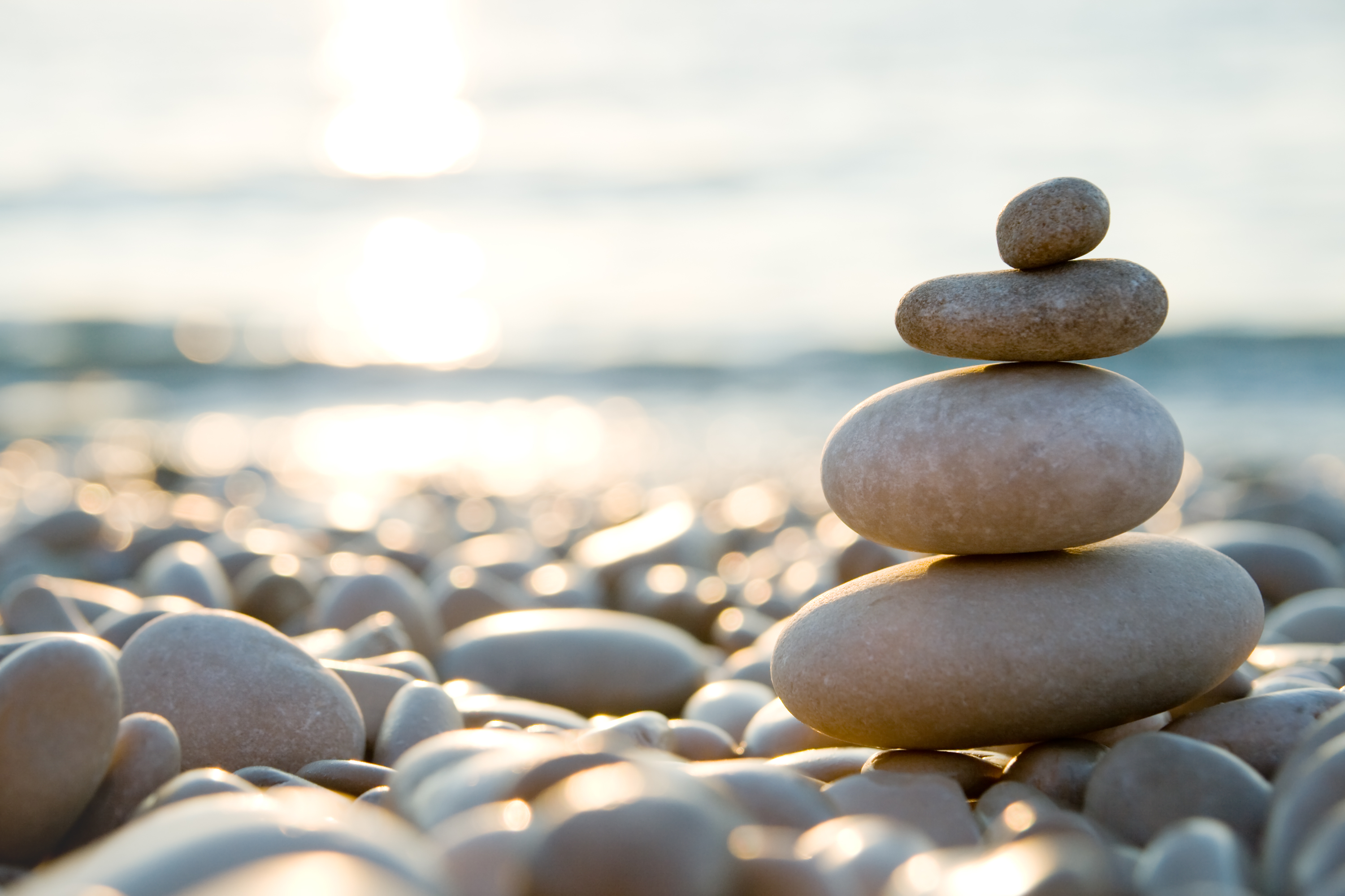 Rocks stacked on top of each other on a beach