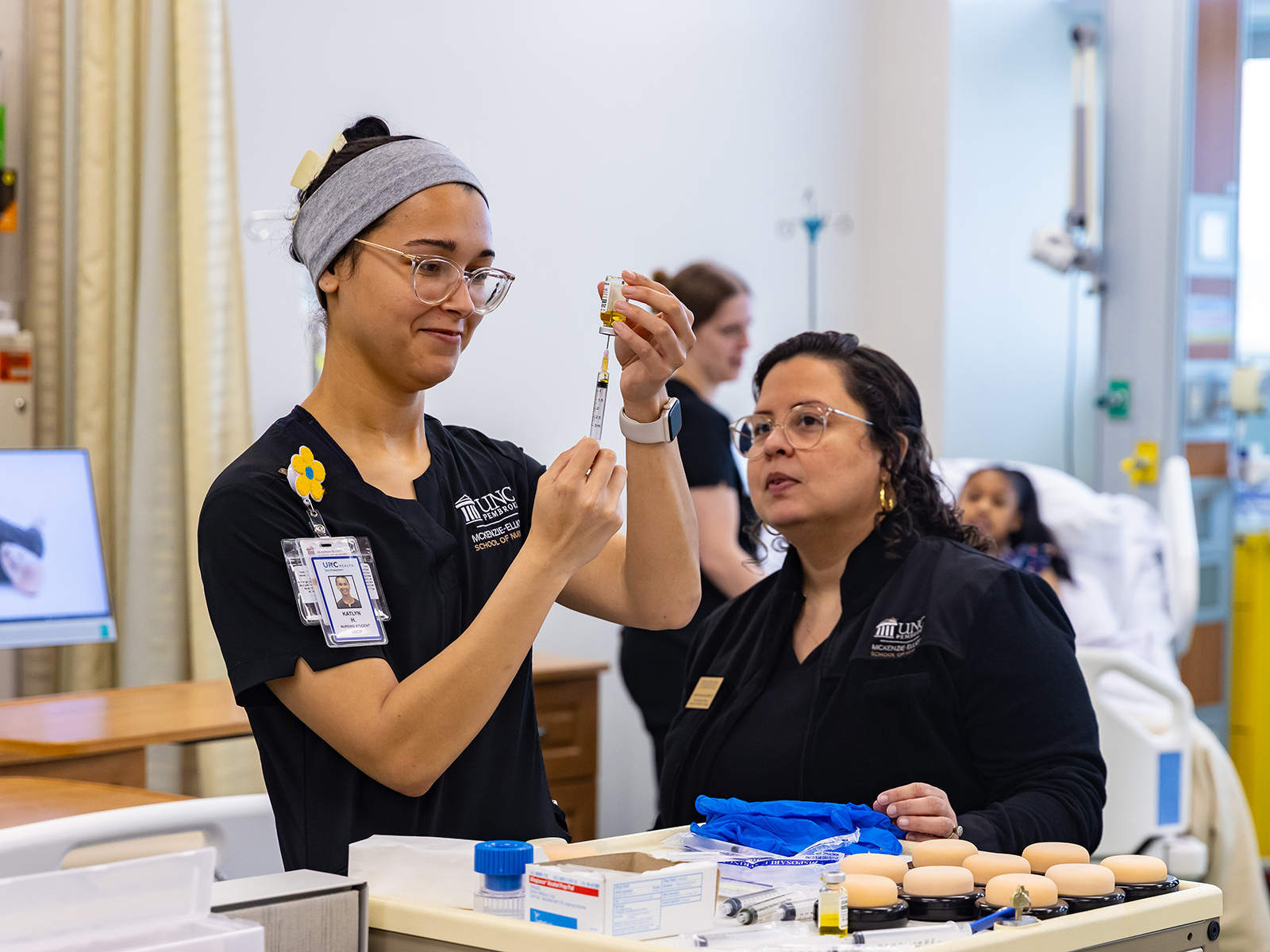 group of nurses in scrubs