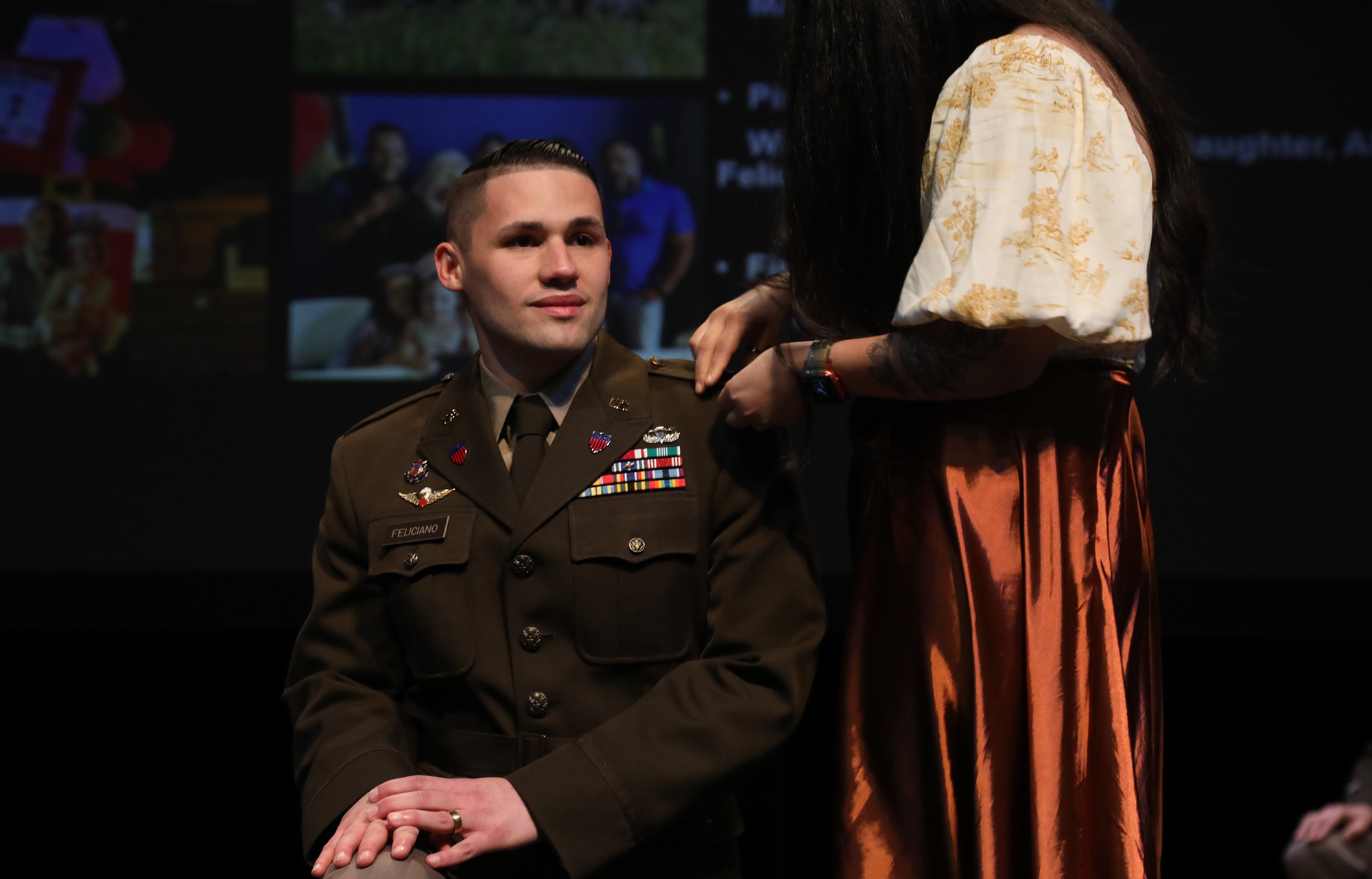 Soldier is pinned during a ROTC UNC Pembroke Commissioning Ceremony