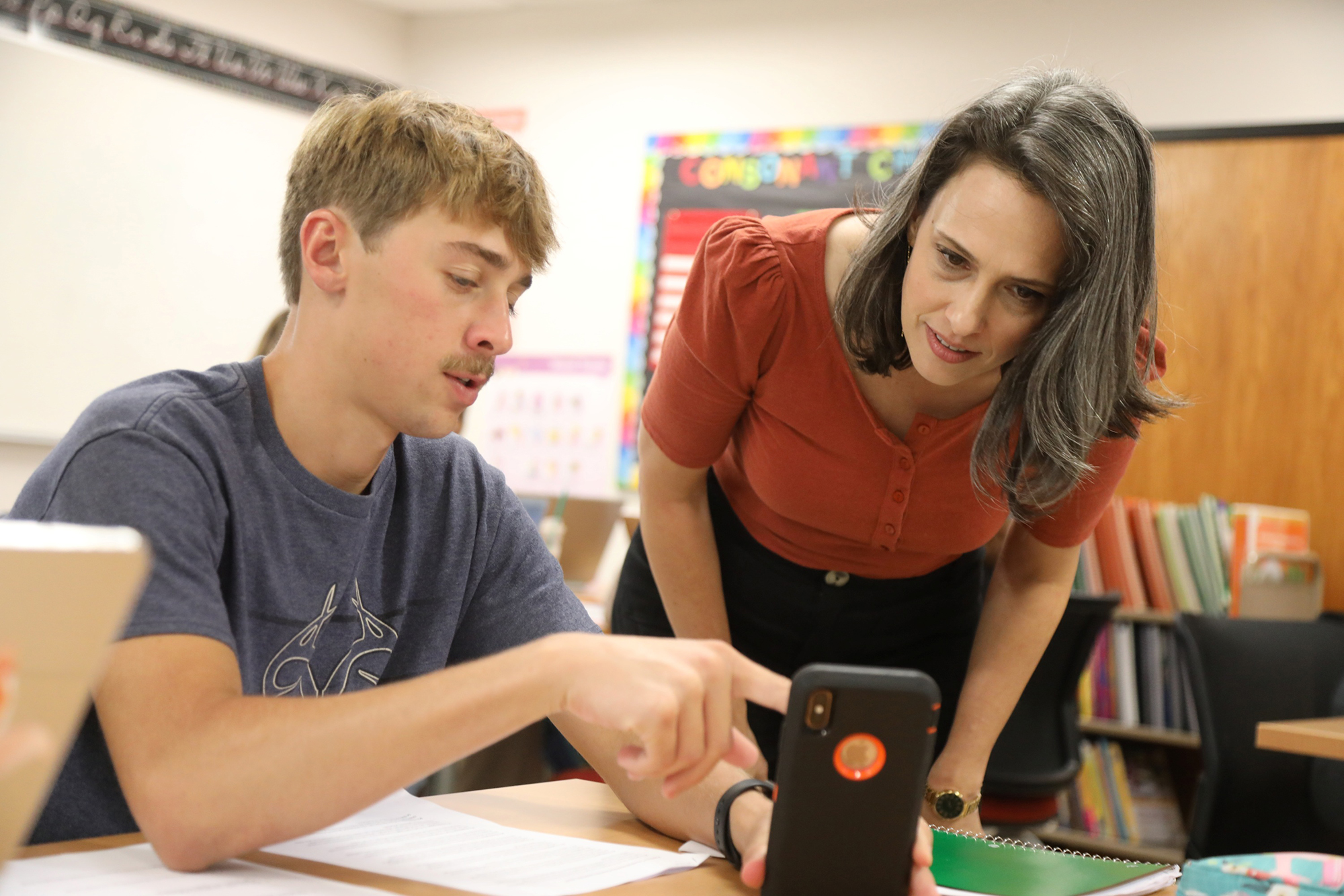 UNCP teacher Melissa Wrenn speaking with a student